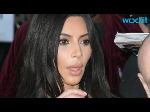 VIDEO : Kim Kardashian Shows Off Her Bump Shopping in Paris