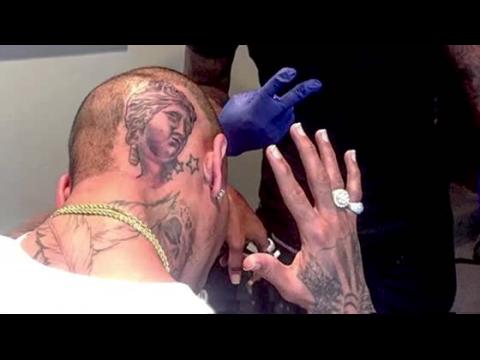 VIDEO : Chris Brown Gets Greek Goddess Tattooed on His Head