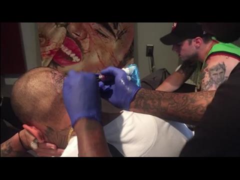 VIDEO : Chris Brown Gets Venus De Milo Tattoo On His Head
