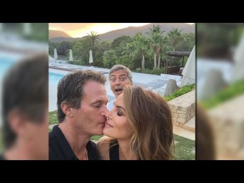 VIDEO : George Clooney photobombs Cindy Crawford kissing snap