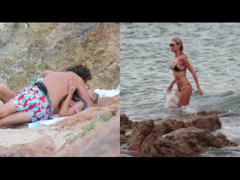 VIDEO : Bikini-Clad Heidi Klum Shows Off PDA on Secluded Italian Beach