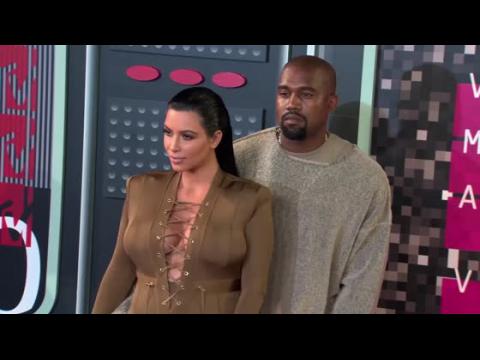 VIDEO : Kanye West and Kim Kardashian Offer Free Shoes to Kidney Seeker