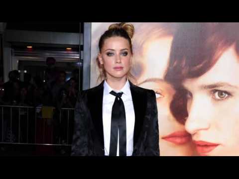 VIDEO : Amber Heard Will Face Smuggling Charges in Trial on April 18