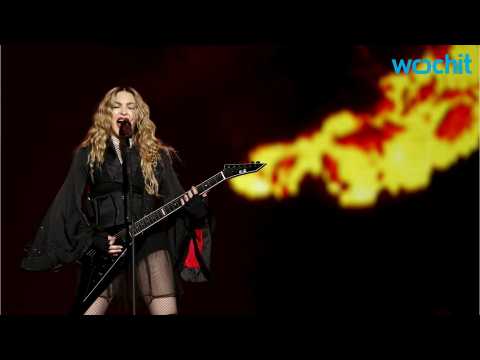 VIDEO : Madonna Plays Unplanned Paris Street Gig as Tribute