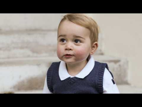 VIDEO : Prince George Trims Holiday Tree!
