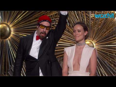VIDEO : Isla Fisher Reveals How She Helped Sacha Baron Cohen Get In Costume At The Oscars