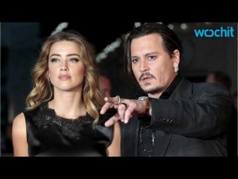 VIDEO : Amber Heard Seems Unaffected By Divorce From Johnny Depp