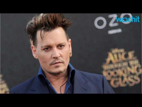 VIDEO : Johnny Depp Rocks Out on Stage Amid Abuse Allegations
