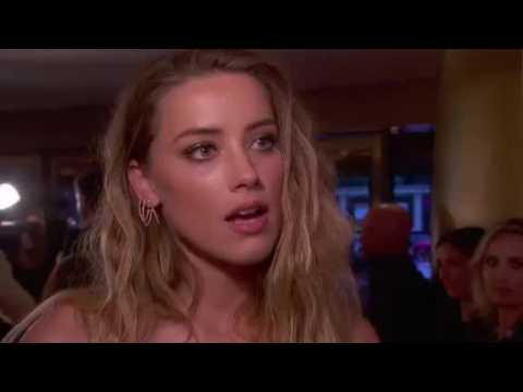 VIDEO : Amber Heard And Elon Musk Take Their Relationship Public