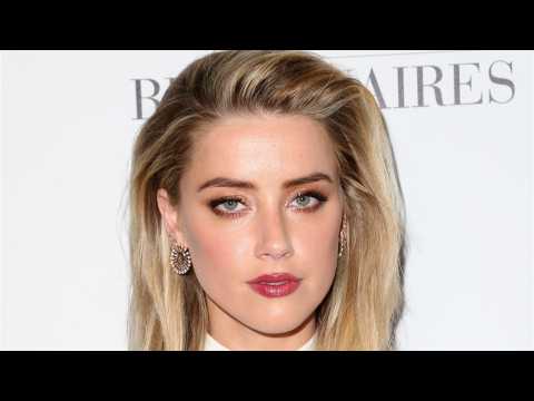 VIDEO : Amber Heard Leaves Gala Before Receiving Award
