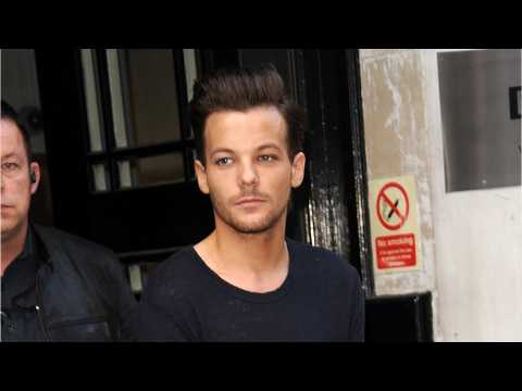 VIDEO : Louis Tomlinson Arrested At Airport