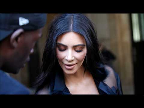 VIDEO : Kim Kardashian Trolls the Internet With Warped Butt Photo