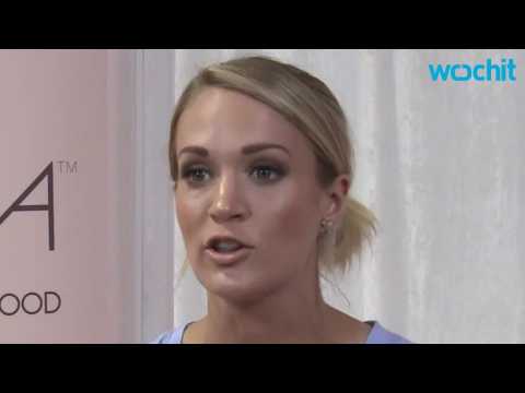 VIDEO : Carrie Underwood Reveals She Made Out With A Fan One Time!