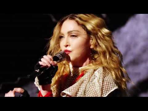 VIDEO : Madonna Busted For Putting Up Fake 'No Parking' Signs!