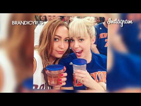 VIDEO : Miley Cyrus shows off engagement ring at basketball game