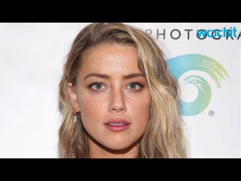 VIDEO : Amber Heard Slapped With $10 Million Lawsuit