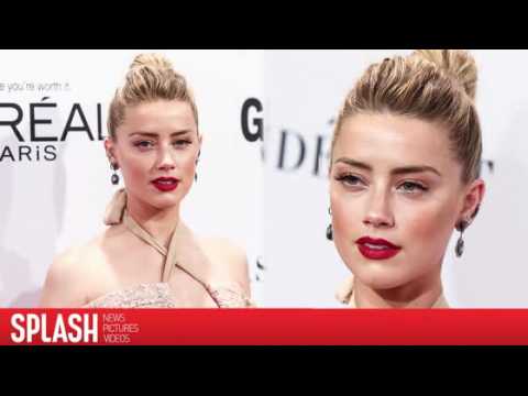 VIDEO : Amber Heard is Getting Sued for $10 Million
