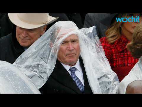 VIDEO : Need A Laugh? Watch George W. Bush Struggles With A Poncho!