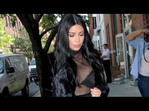 VIDEO : Kim Kardashian Bares Her Bra in Sheer Maternity Outfit