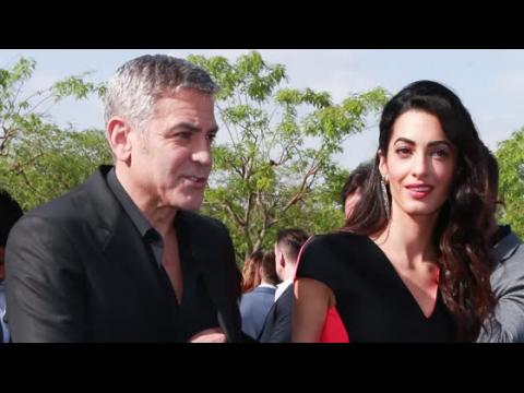 VIDEO : George Clooney Jokes He's the 'Arm Candy' in His Marriage