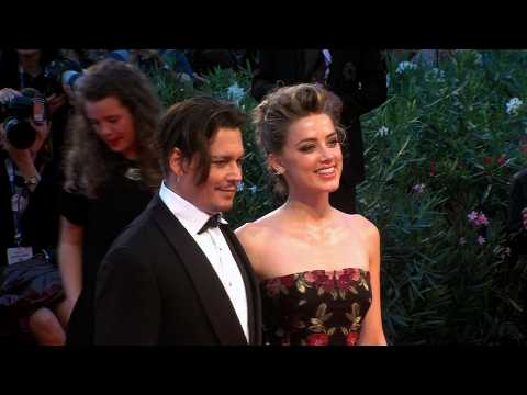 VIDEO : Johnny Depp and Amber Heard end divorce drama