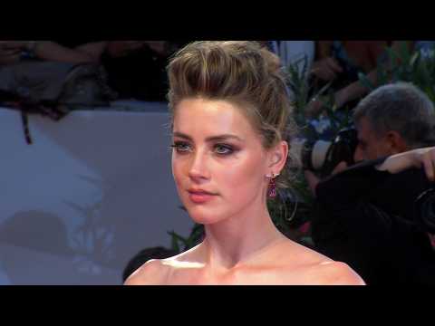VIDEO : Amber Heard pleads guilty in dog smuggling case