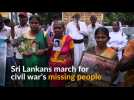 Families of people missing in Sri Lanka's civil war march in silence