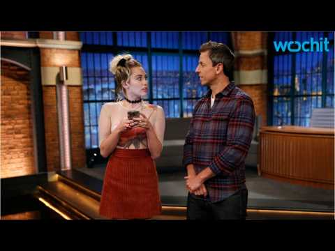 VIDEO : Seth Myers Tries Hard To Impress Miley Cyrus