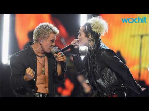 VIDEO : Billy Idol Joined By Miley Cyrus At iHeartRadio Music Fest Show