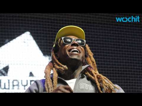 VIDEO : Lil Wayne Issues Threat to Music Label