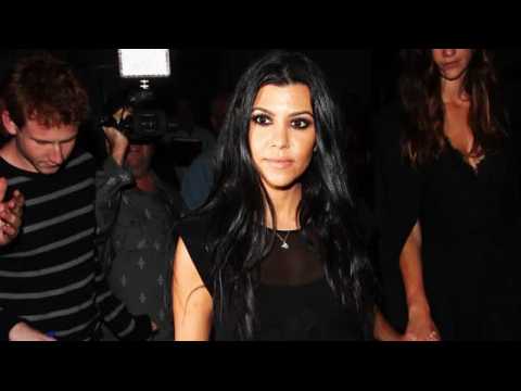 VIDEO : Kourtney Kardashian Gets Swamped, Swears at Photographers
