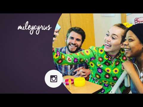 VIDEO : Miley Cyrus and Liam Hemsworth bring holiday cheer to sick kids
