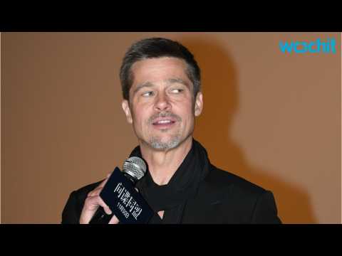 VIDEO : Brad Pitt Is All Smiles at Rare Post-Split Appearance at Celebrity Charity and Rock Event