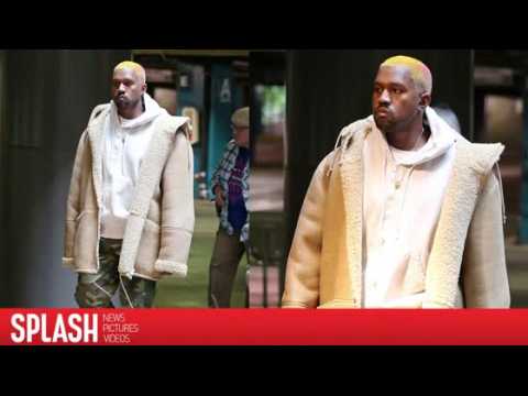 VIDEO : Kanye West Catches a Movie With Pink Hairdo