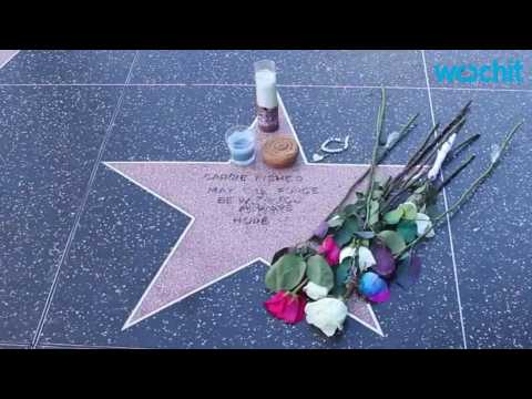 VIDEO : Carrie Fisher's Fan-Created Walk of Fame Star Draws Crowds Day After Actress' Death