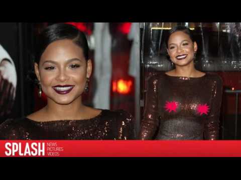 VIDEO : Christina Milian Wears See-Through Dress at Live By Night Premiere