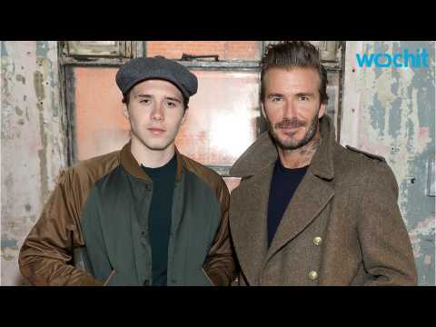 VIDEO : Victoria Beckham and Son Brooklyn Support David at London Fashion Week Men's