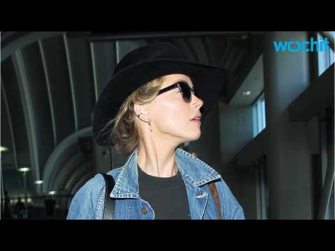 VIDEO : Amber Heard Heads Back To Australia