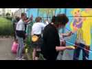 Calais : réalisation d'une fresque par les habitants à la Maison de la famille
