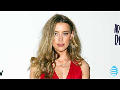 VIDEO : Amber Heard Is Now Rocking Pink