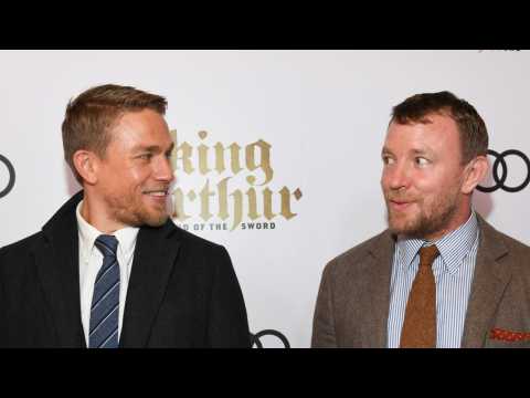 VIDEO : Guy Ritchie Jokingly Calls Out Charlie Hunnam