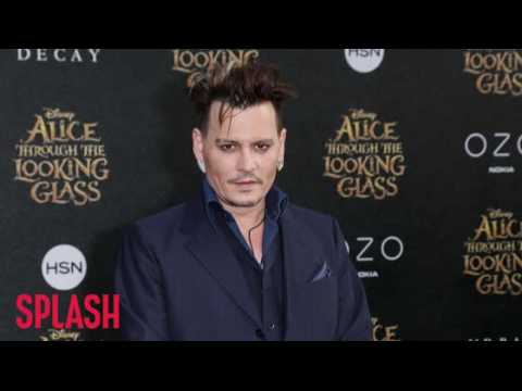 VIDEO : Johnny Depp Accused of Wearing Ear Piece to Avoid Learning Lines