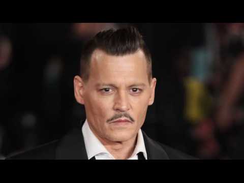 VIDEO : Johnny Depp Sued by His Lawyers