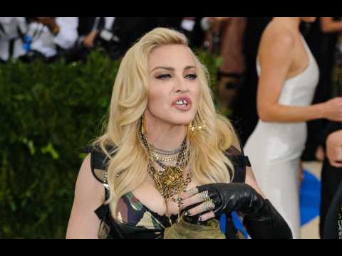 VIDEO : Madonna nude photos up for auction