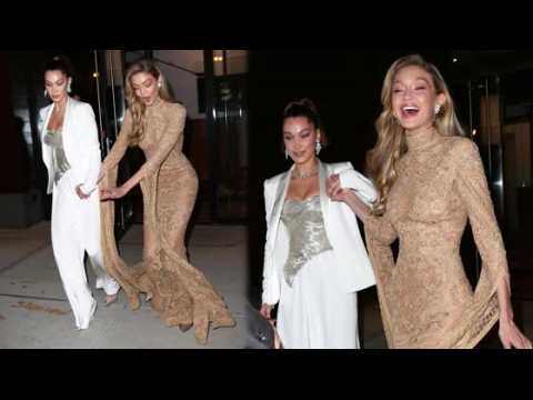 VIDEO : Gigi Hadid Narrowly Takes a Tumble in Champagne Dress