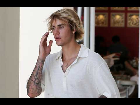 VIDEO : Justin Bieber 'punched man who grabbed woman by throat'