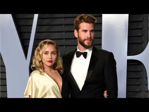 VIDEO : Photo Stirs Rumors That Miley Cyrus and Liam Hemsworth Are Married