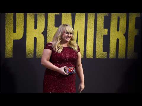 VIDEO : Rebel Wilson Sings On To Produce, Star In Comic Book Movie 'Crowded'