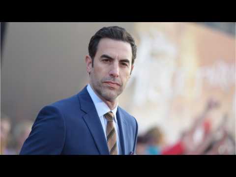 VIDEO : Sacha Baron Coen Teases Possible Trump University Project