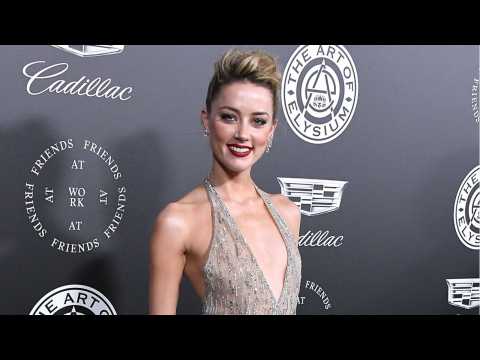 VIDEO : Amber Heard Dazzles In Sparking Gown At Art Of Elysium Gala